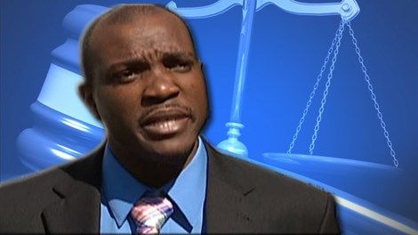 Nick Hillary gavel  justice scales Caption